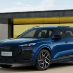 Vista dianteira em três quartos do Audi Q6 e-tron S line 2026