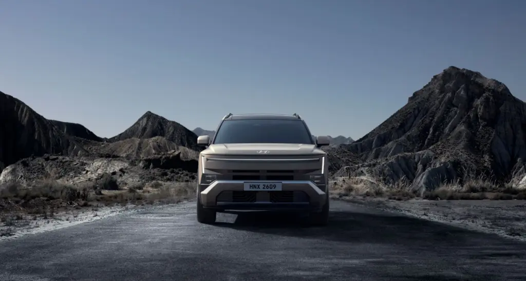 Hyundai Tucson 2027: Frente do Tucson em cenário de montanha — modelo internacional